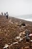 high tide lines of washed up trash
