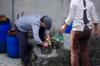 next photo: Shangjung and Spanish friend helps peel the Chinese yam