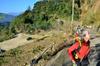 next photo: Investigating the landslide and running bamboo monoculture