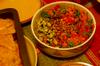 Chana masala with tomato, roasted capsicum, cilantro salsa and sauteed zuccini and onions becomes 