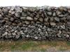 Windbreak walls made of basalt and coral stone