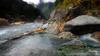 next photo: Downstream Yading outcrop pool